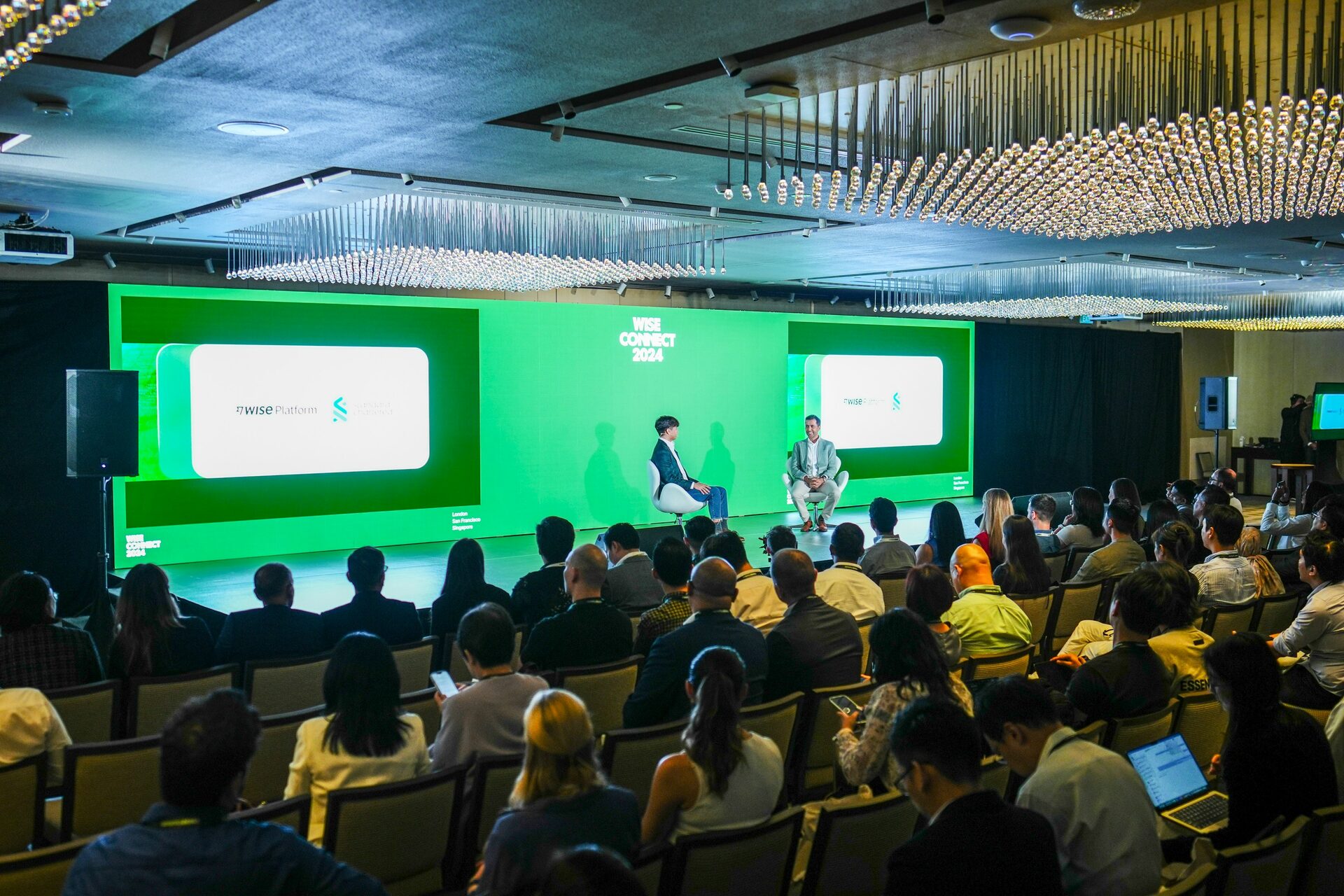 Professional panel discussion before a conference audience